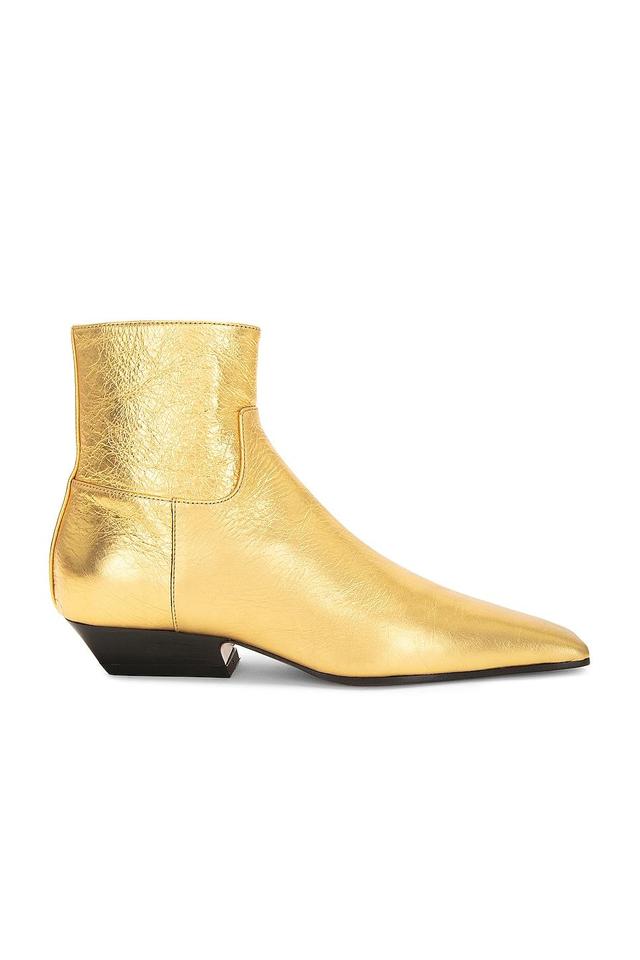 KHAITE Marfa Classic Flat Ankle Boot in Gold - Metallic Gold. Size 37.5 (also in 36.5, 38, 39, 39.5, 40). Product Image