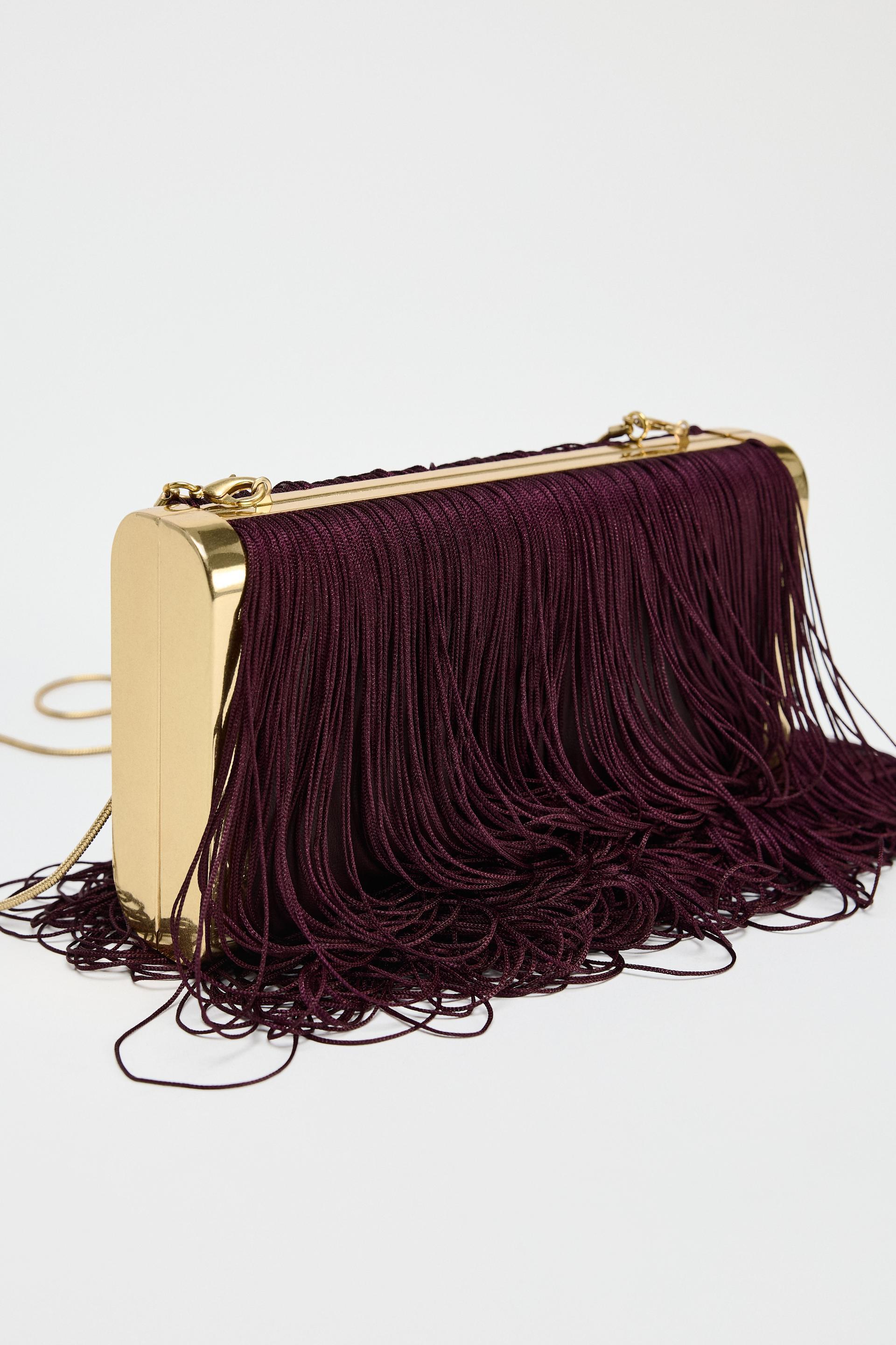 FRINGE CLUTCH Product Image