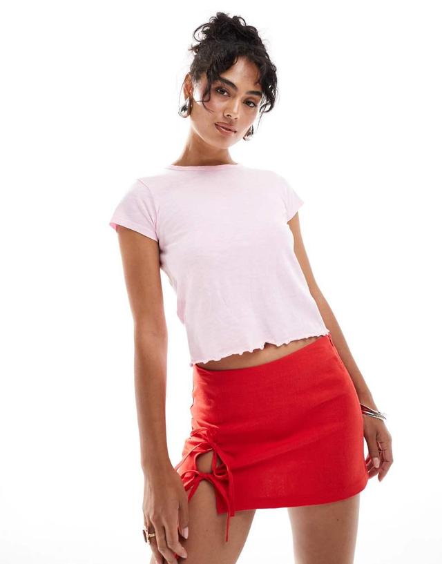 Mango lettuce hem top in pink Product Image