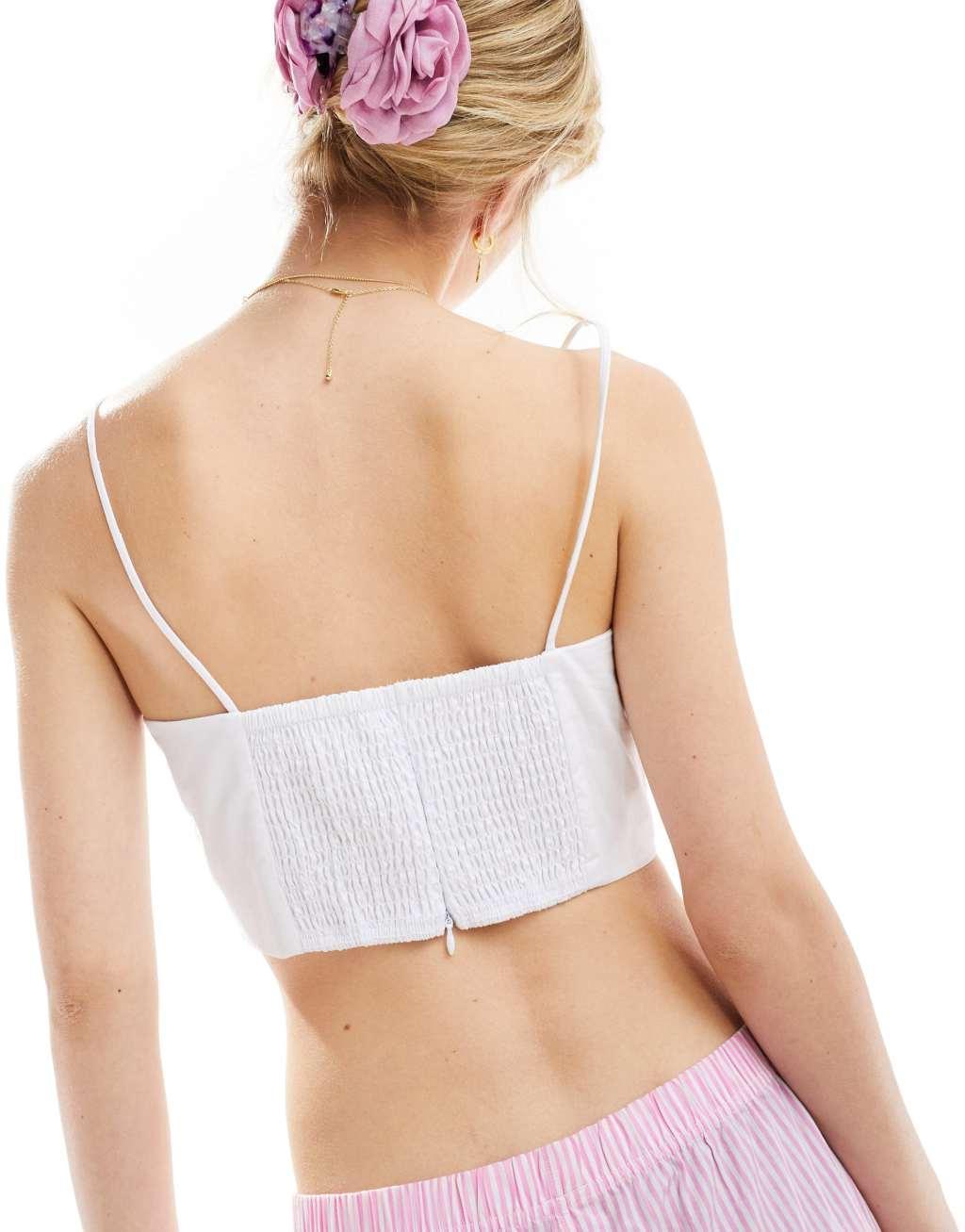 Glamorous strappy cami crop top with corsage rosette detail in white Product Image