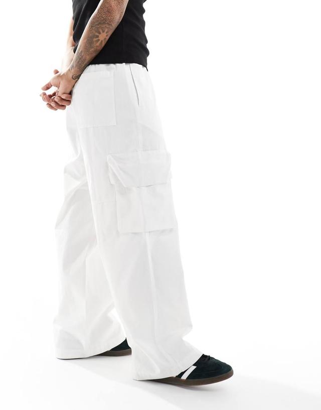 ASOS DESIGN super baggy cargo pants with panel details in ecru Product Image