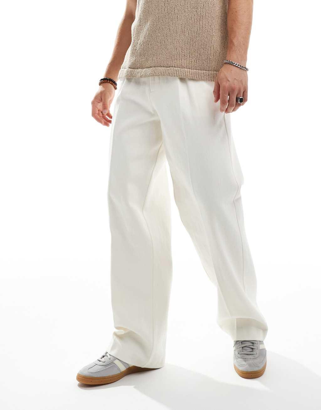 ASOS DESIGN smart wide leg pants in white textured fabric Product Image