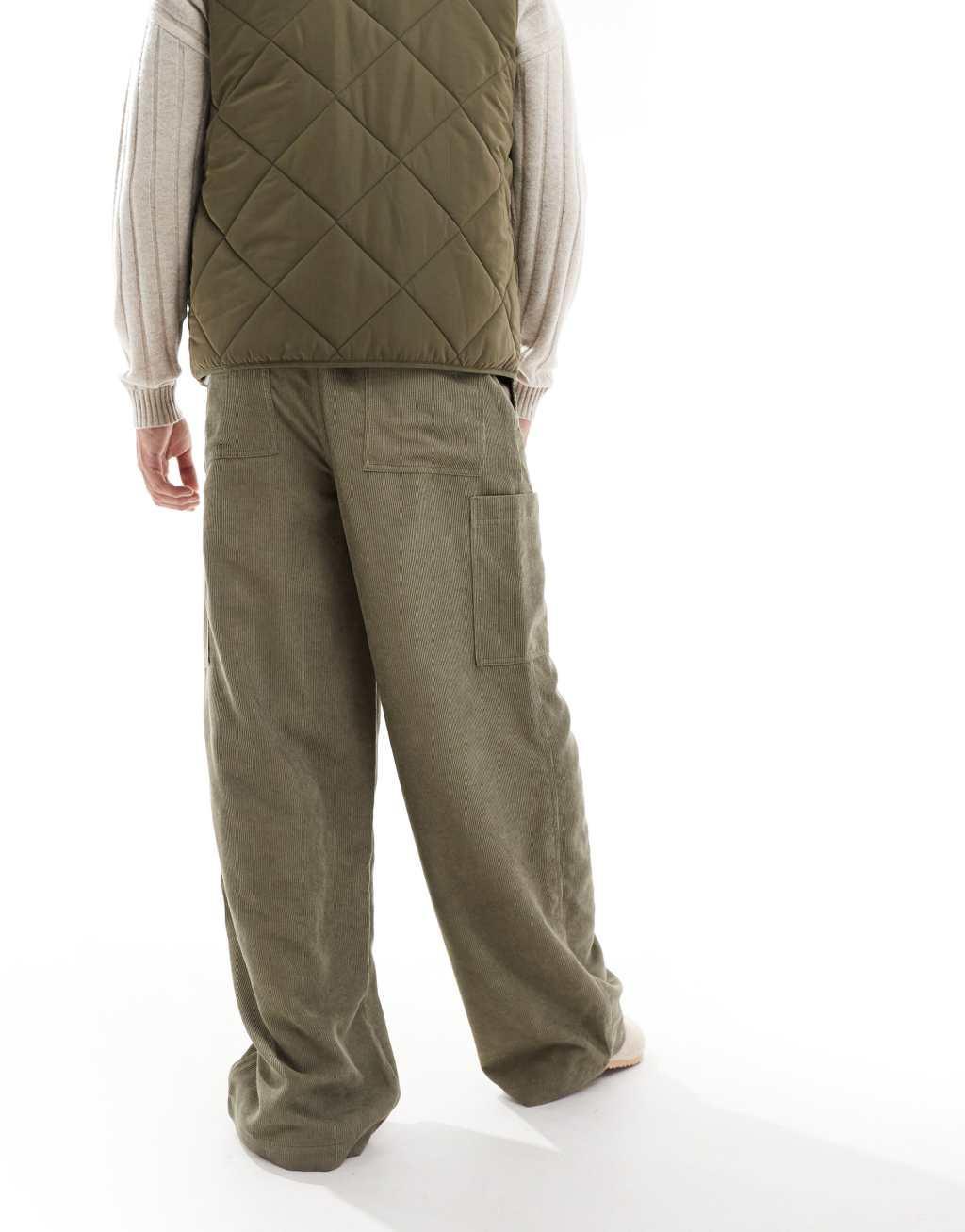 ASOS DESIGN super baggy corduroy cargos in green wash Product Image