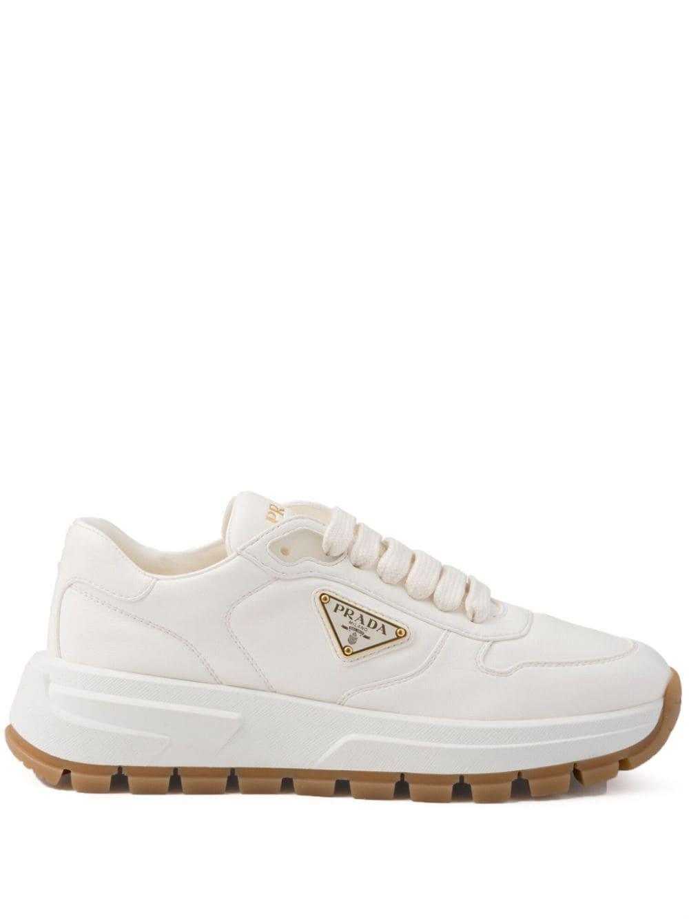 Leather Logo Runner Sneakers In White Product Image