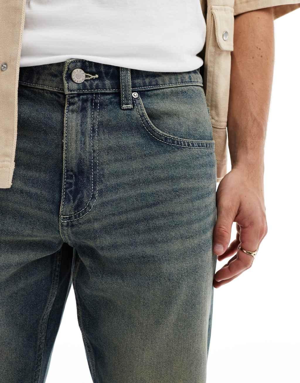 ASOS DESIGN tapered fit jeans in mid wash blue Product Image