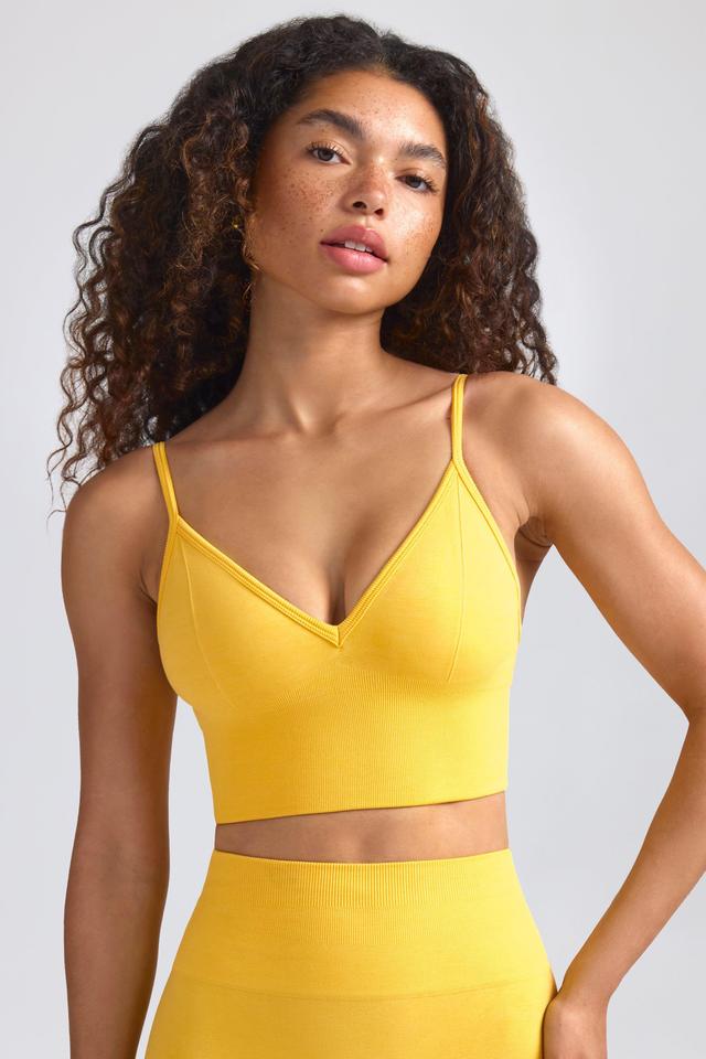 Define Luxe V-Neck Sports Bra in Golden Yellow Female Product Image