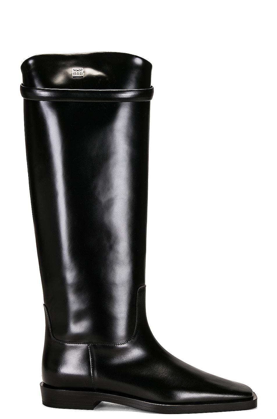 Toteme The Riding Boot in Black - Black. Size 35 (also in 36, 40, 41). Product Image