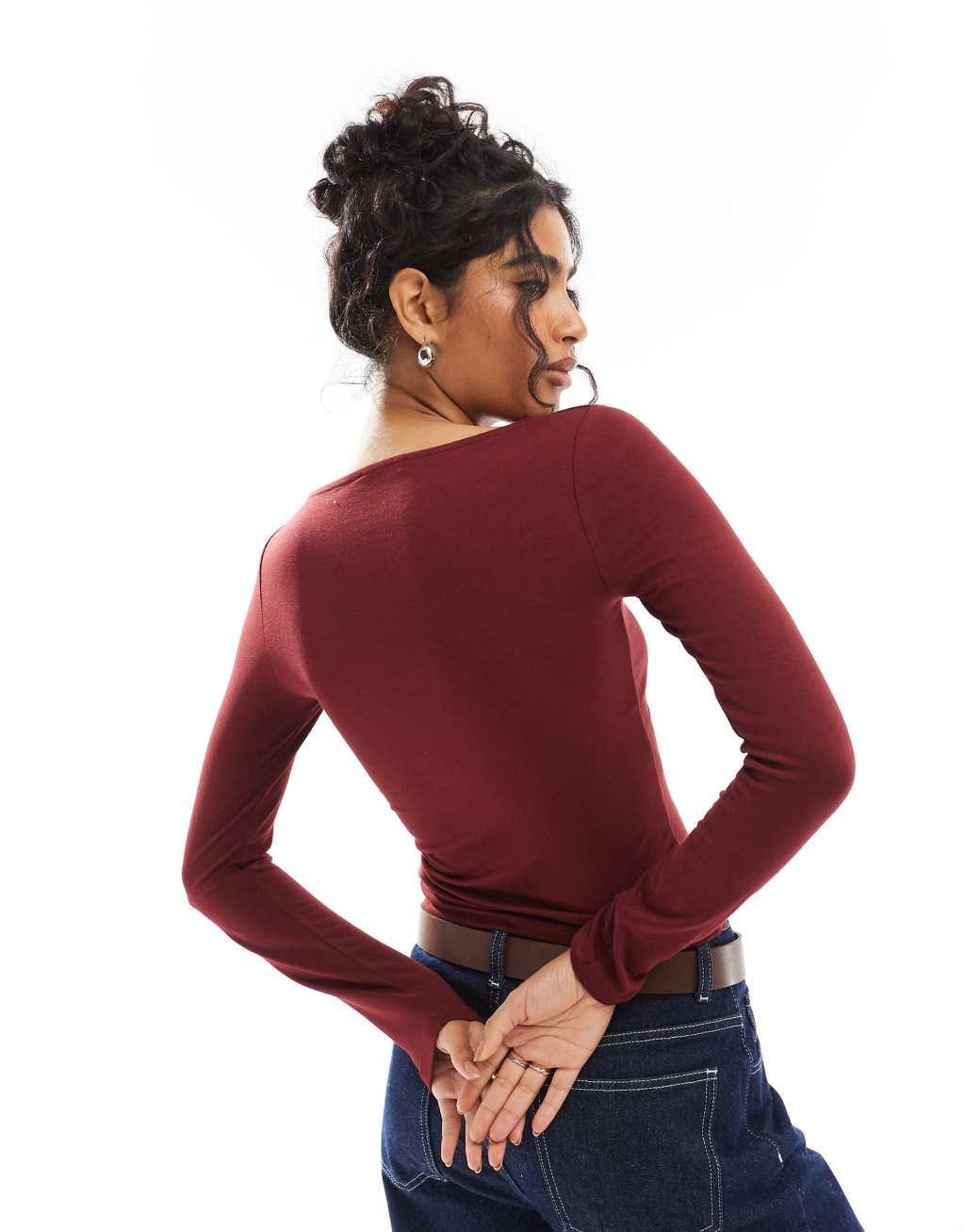 ASOS DESIGN open twist detail long sleeve top in burgundy Product Image