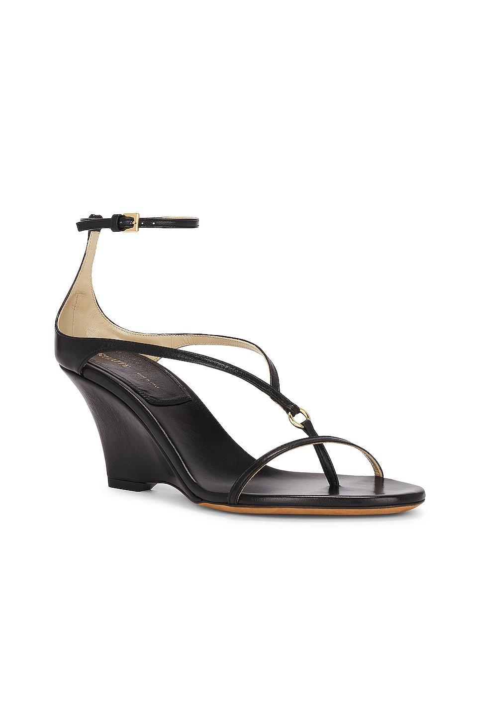 KHAITE Marion Ankle Strap Wedge Sandal in Black Product Image