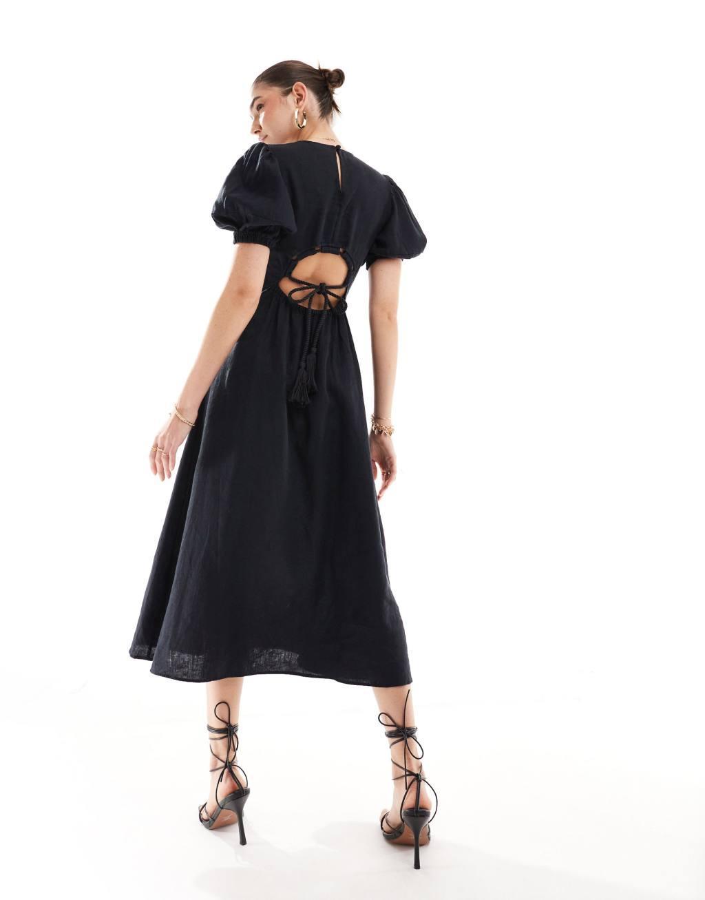 & Other Stories midi dress with volume sleeves and open back detail with tassels in black Product Image