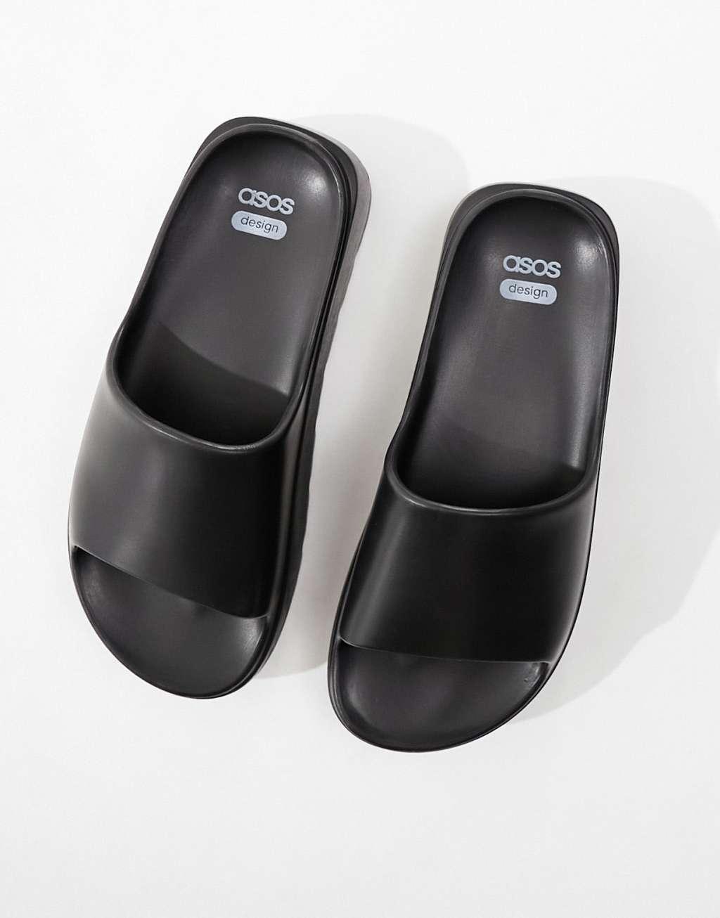 ASOS DESIGN Freedom cleated flatform slides in black Product Image