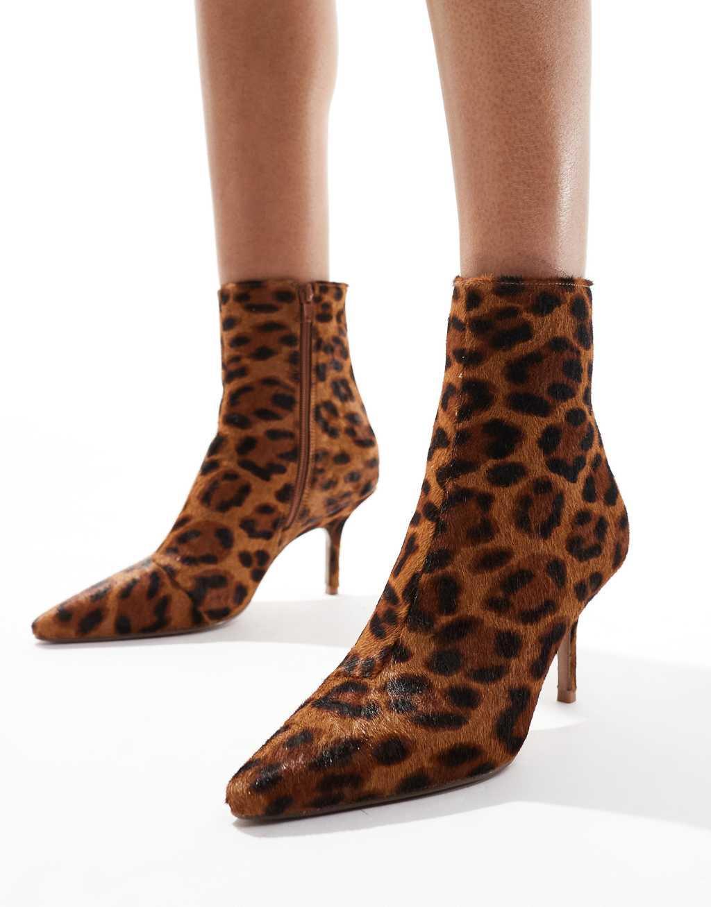 ASOS DESIGN Replay leather pointed toe mid-heel boots in leopard pony Product Image