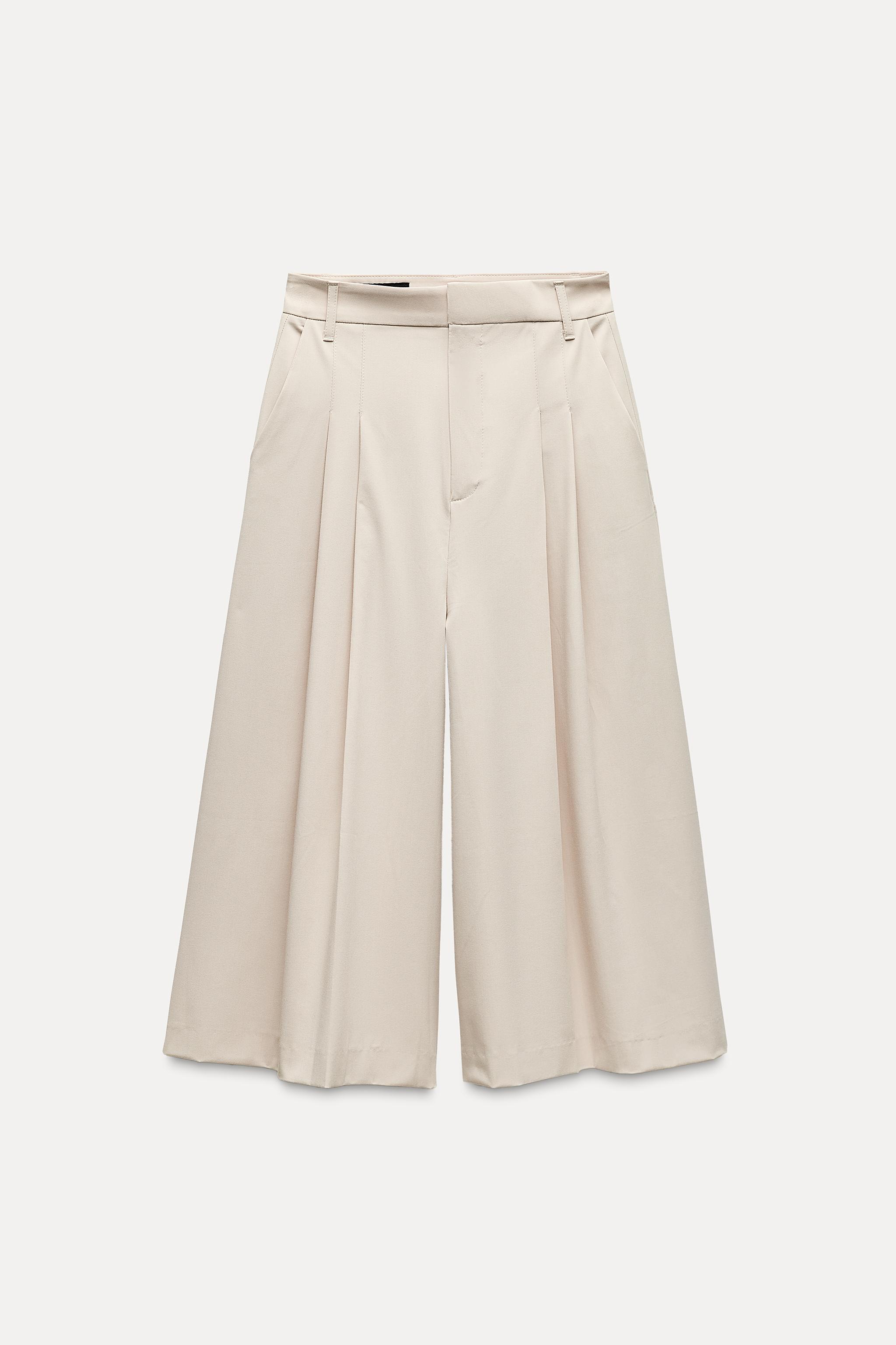 PLEATED SHORTS Product Image