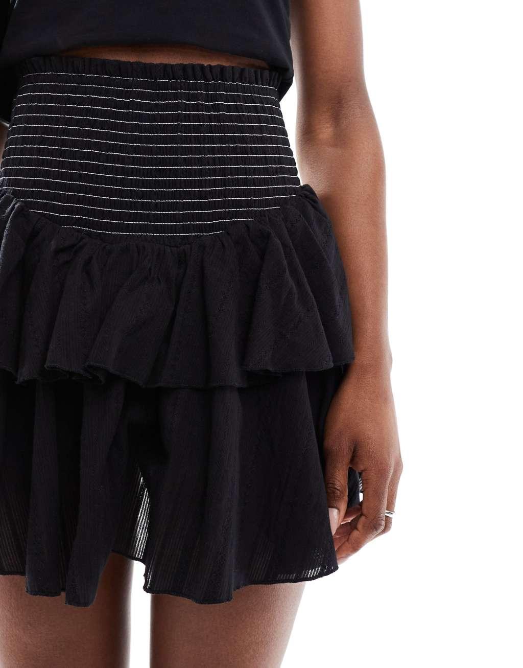 Urban Revivo shirred waist detail tiered ruffle rara mini skirt in black Product Image