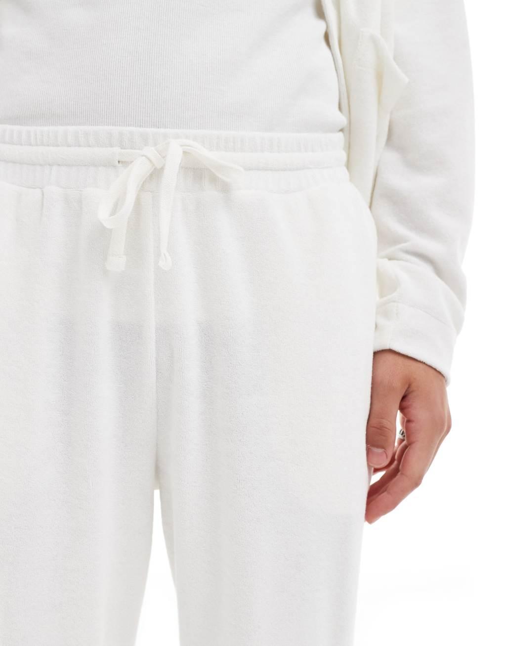 ASOS DESIGN straight leg sweatpants in texture in off white Product Image