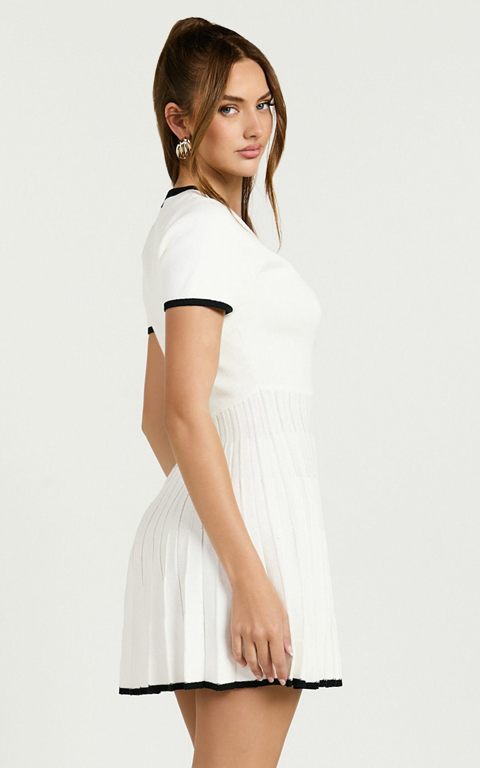 Vivienne Mini Dress - Short Sleeve Pleated Skirt Knitted Dress in Cream Product Image