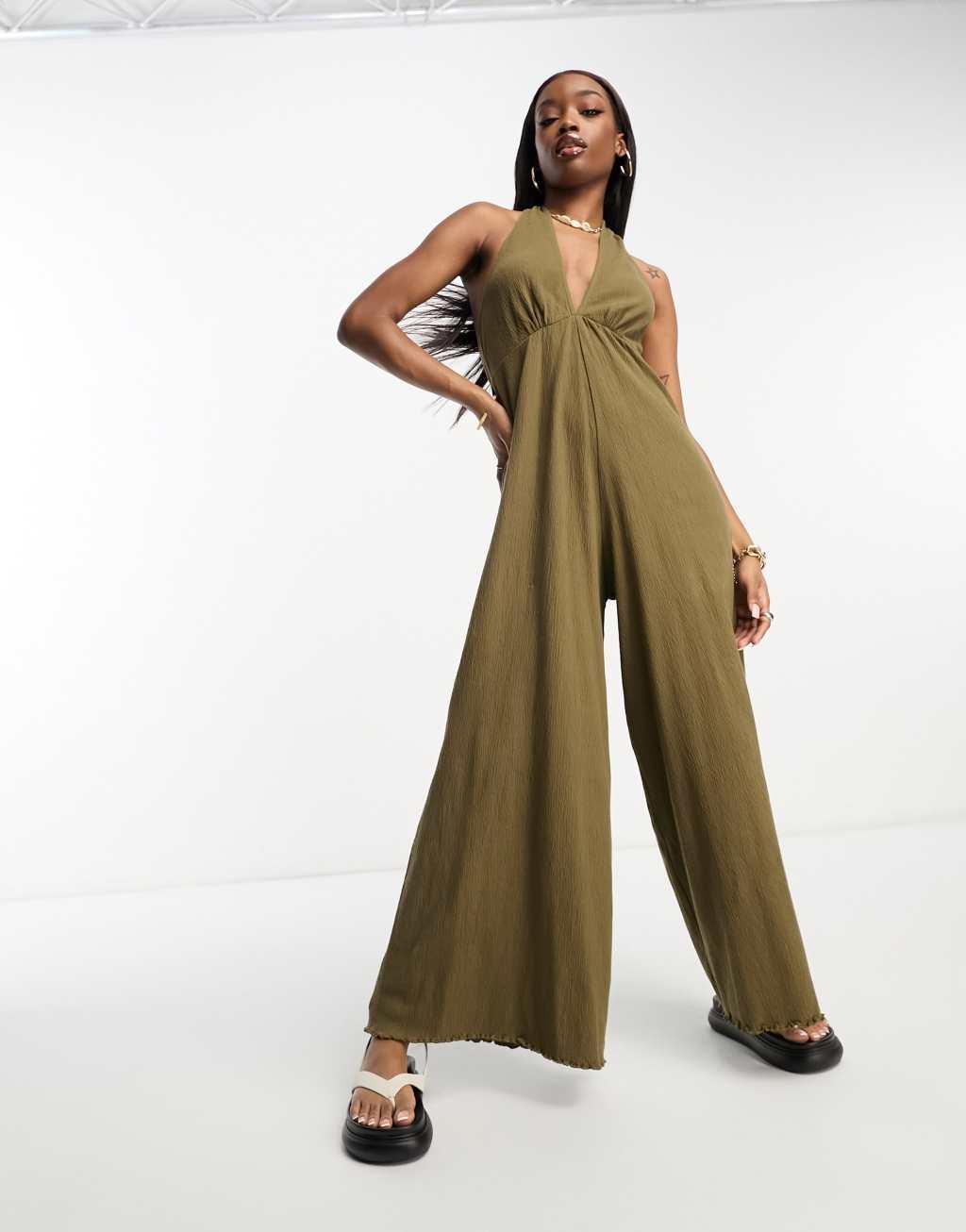 ASOS DESIGN crinkle jersey halter jumpsuit in olive Product Image