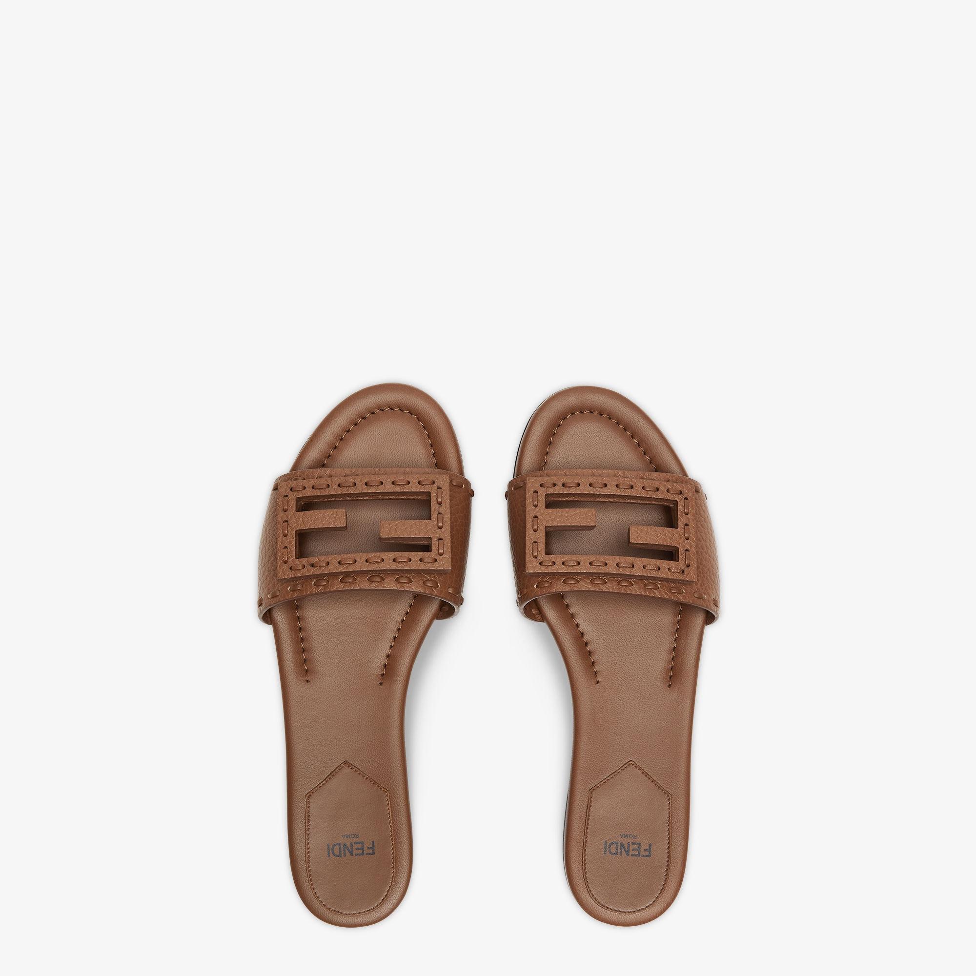 BaguetteBrown leather slides product image