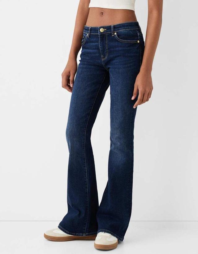 Bershka high rise flared jeans in dark wash Product Image