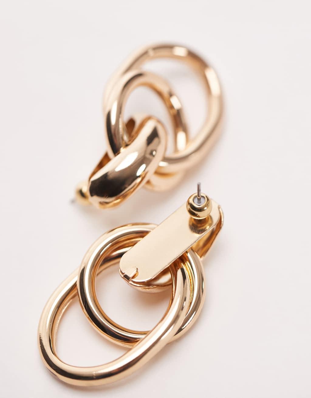 Topshop Eloise double drop door knocker earrings in gold tone Product Image