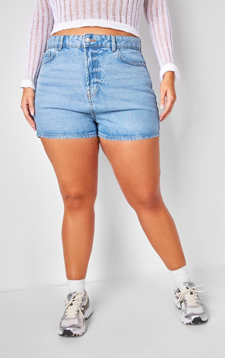 PRETTYLITTLETHING Plus Mid Blue Wash Basic Denim Shorts Product Image