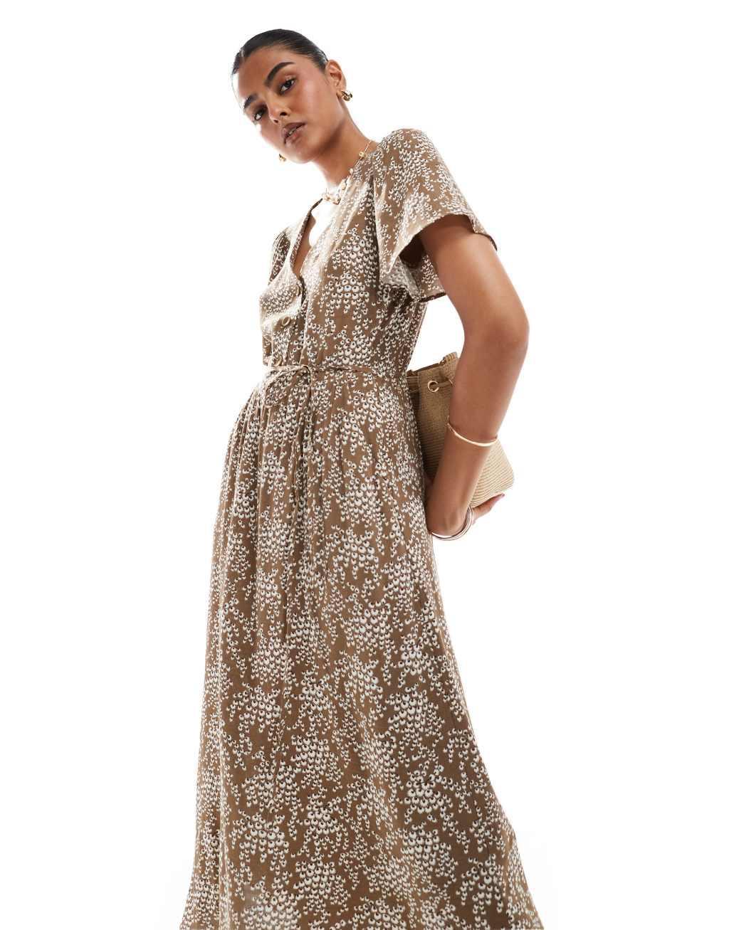 & Other Stories linen blend midaxi dress with ruched bodice detail and tiered hem in floral print Product Image