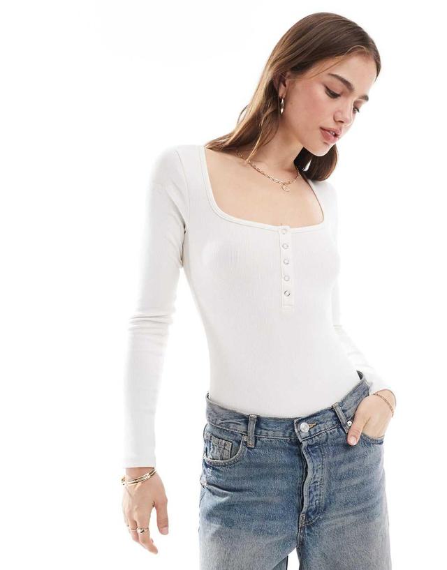 Miss Selfridge long sleeve scoop neck henley snap bodysuit in ivory Product Image