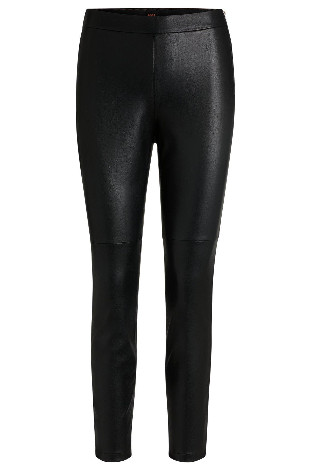 Paneled trousers in coated faux leather product image