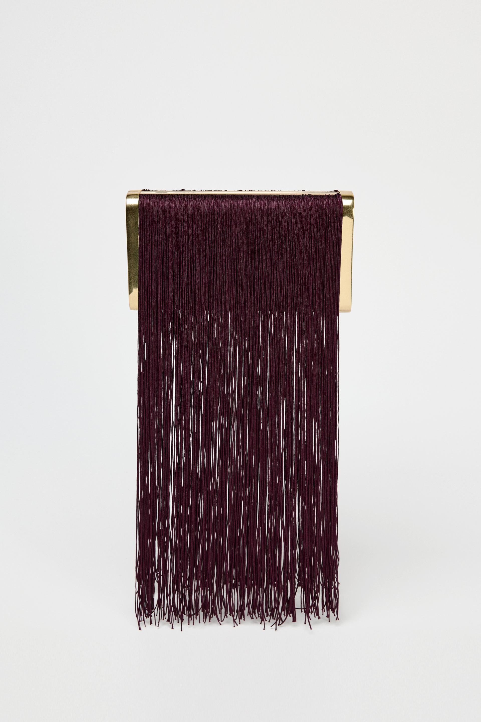 FRINGE CLUTCH Product Image