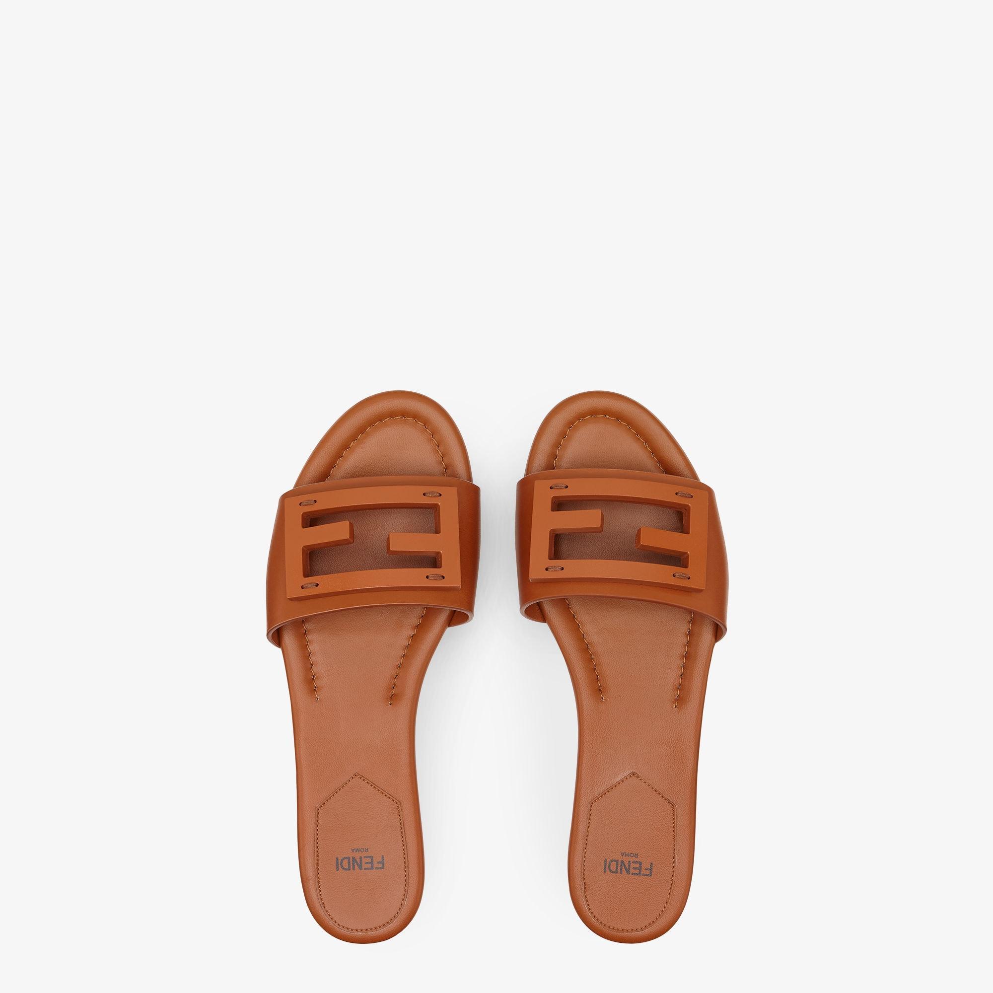 BaguetteBrown leather slides product image