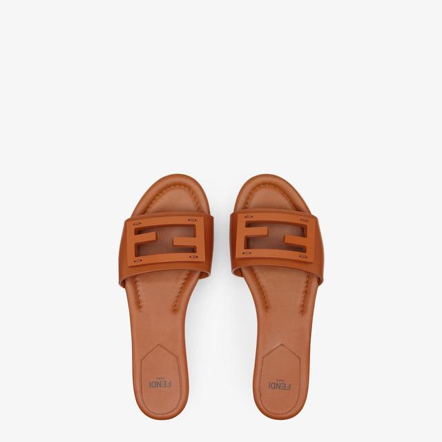 BaguetteBrown leather slides Product Image