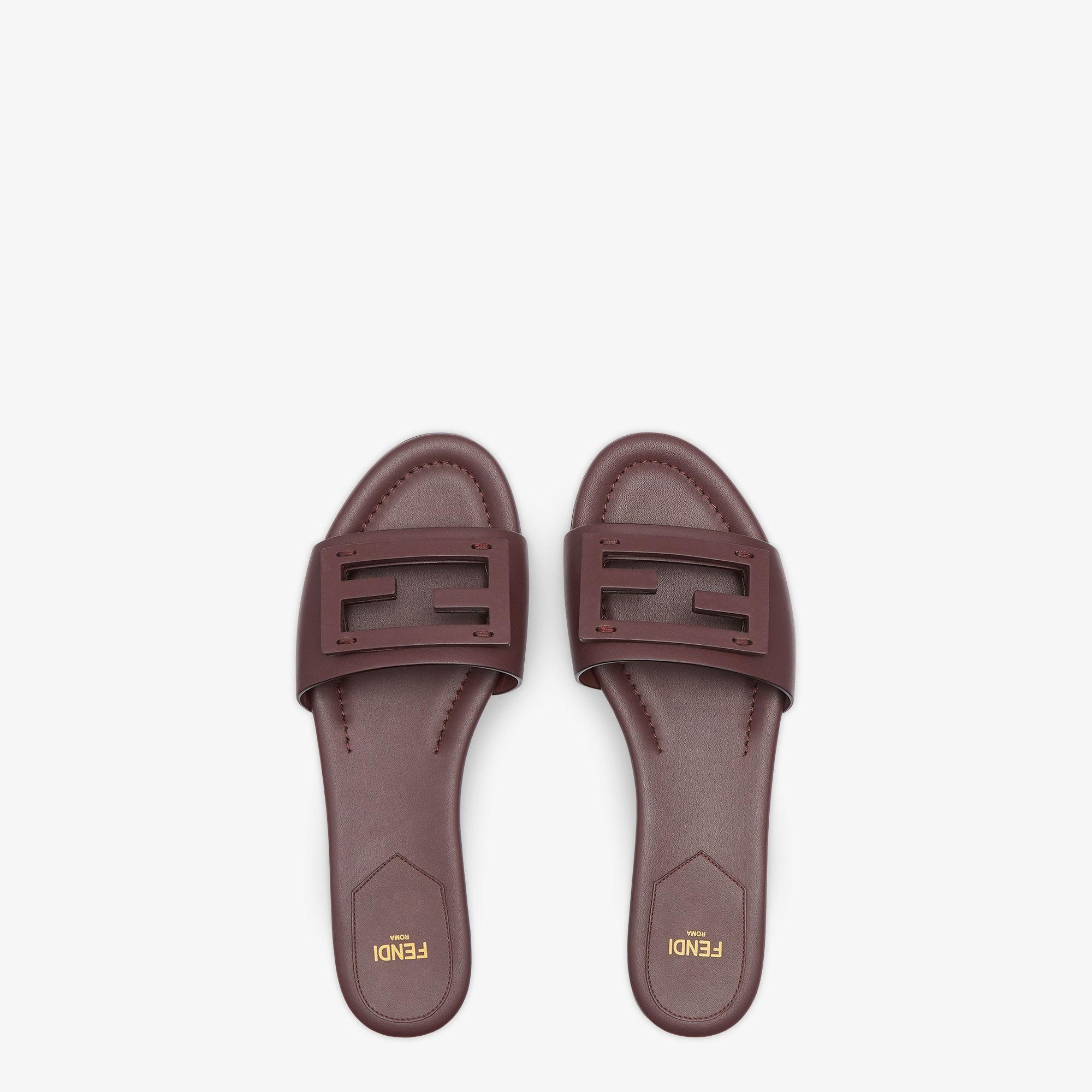 BaguetteBrown leather slides Product Image