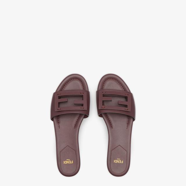 BaguetteBrown leather slides Product Image