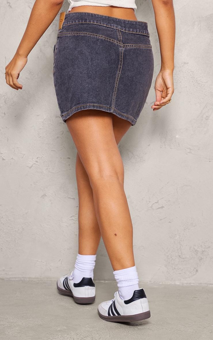 Petite Washed Black Denim Low Rise Badge Detail Mini Skirt Product Image