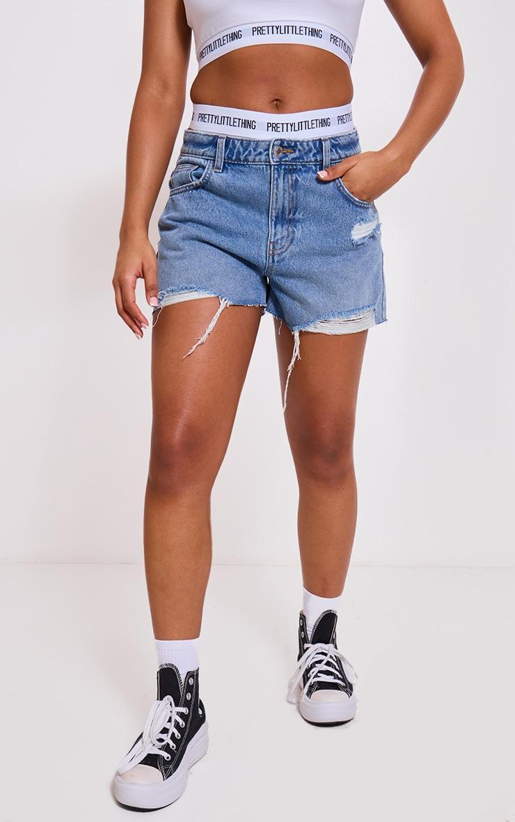 PRETTYLITTLETHING Mid Blue Wash Distressed High Rise Mom Denim Shorts Product Image