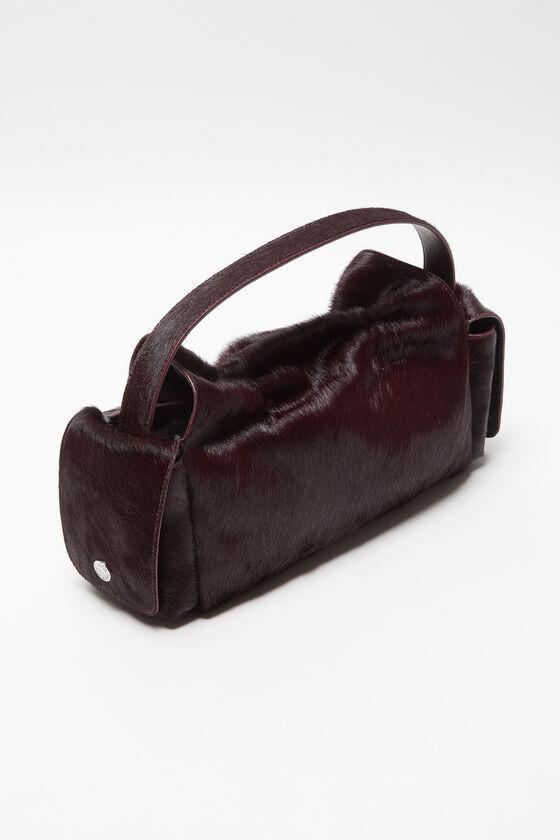 Multipocket furry leather bag Product Image