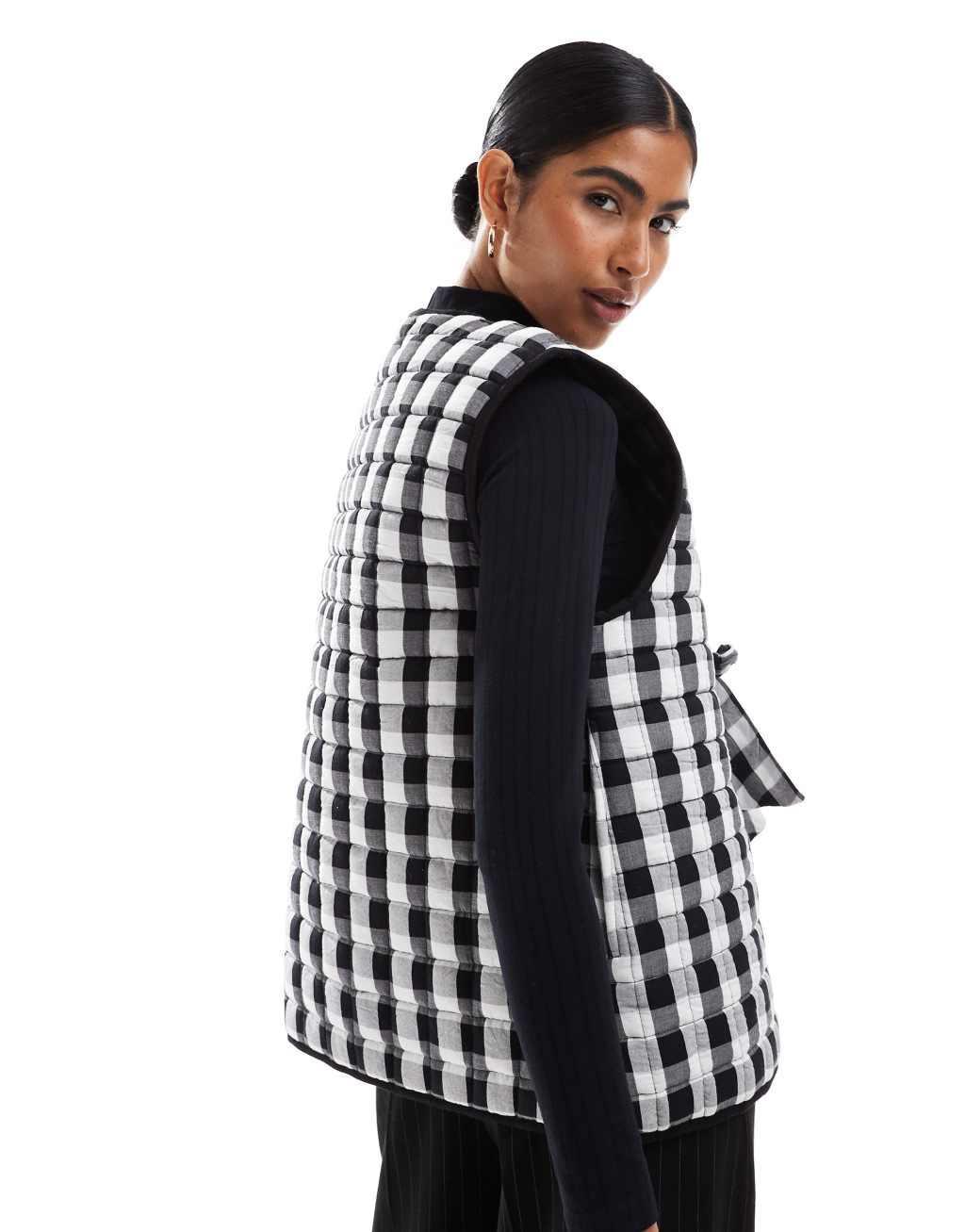 ASOS DESIGN quilted vest with bows in mono gingham Product Image