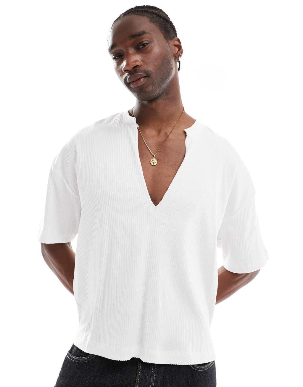 ASOS DESIGN oversized boxy ribbed T-shirt with deep cut V-neck in white Product Image