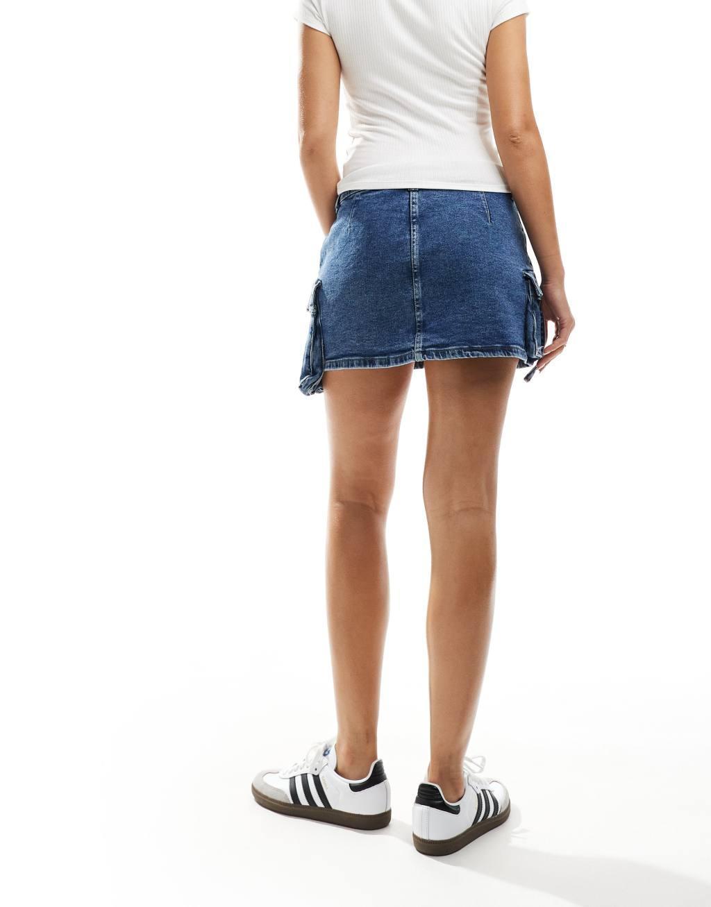 Noisy May denim mini skirt with cargo detail in blue acid wash Product Image