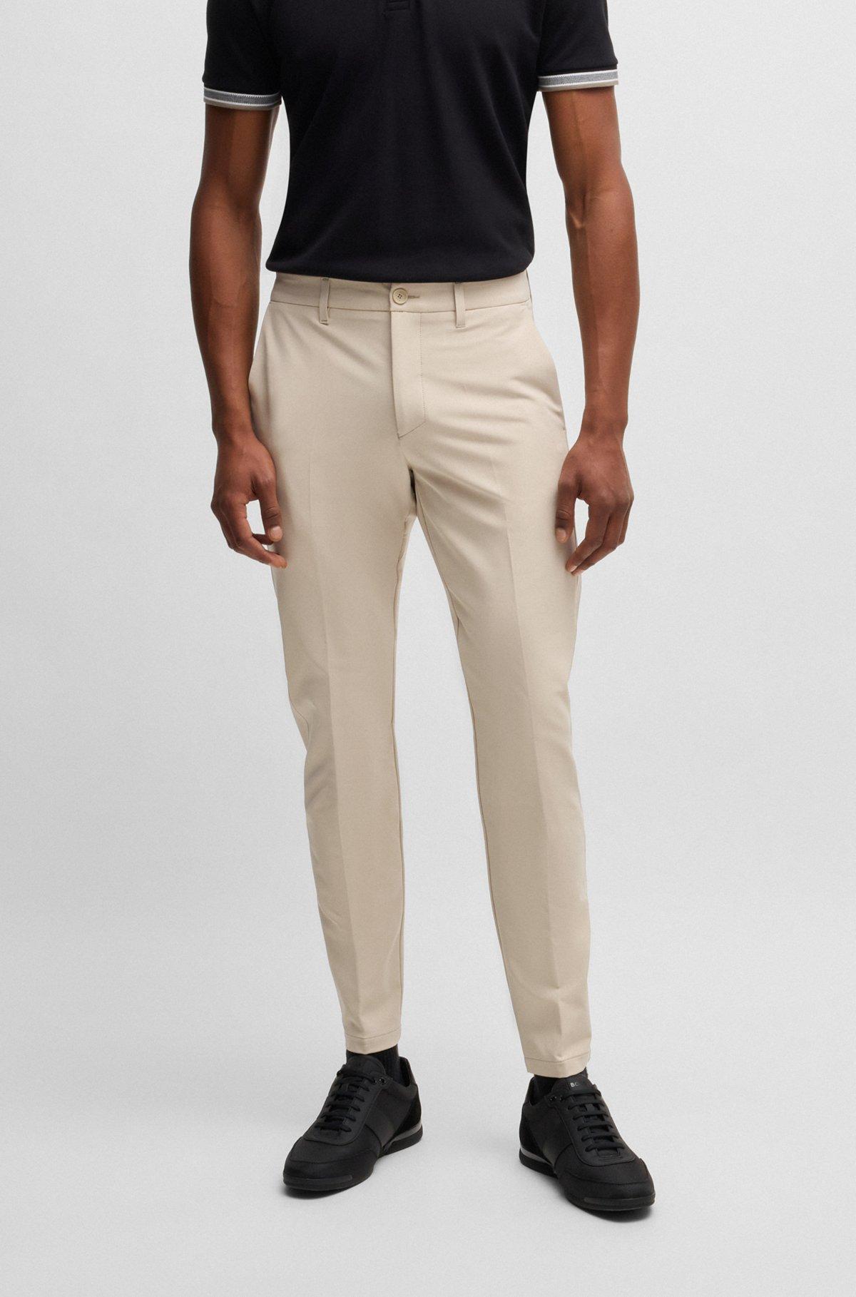 Slim-fit trousers in water-repellent stretch fabric Product Image