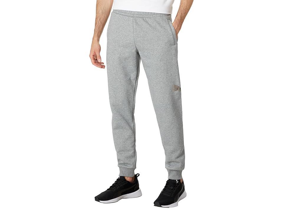 PUMA Essentials+ Logo Lab Holiday Sweatpants (Medium Heather) Men's Clothing Product Image