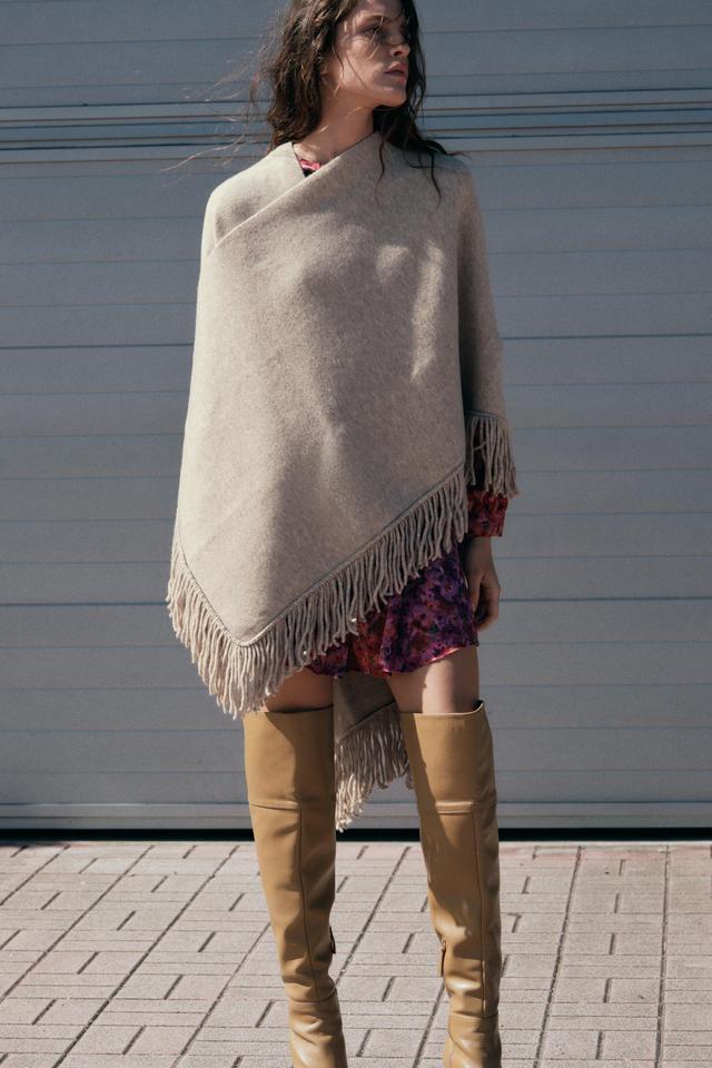 FRINGED KNIT CAPE Product Image