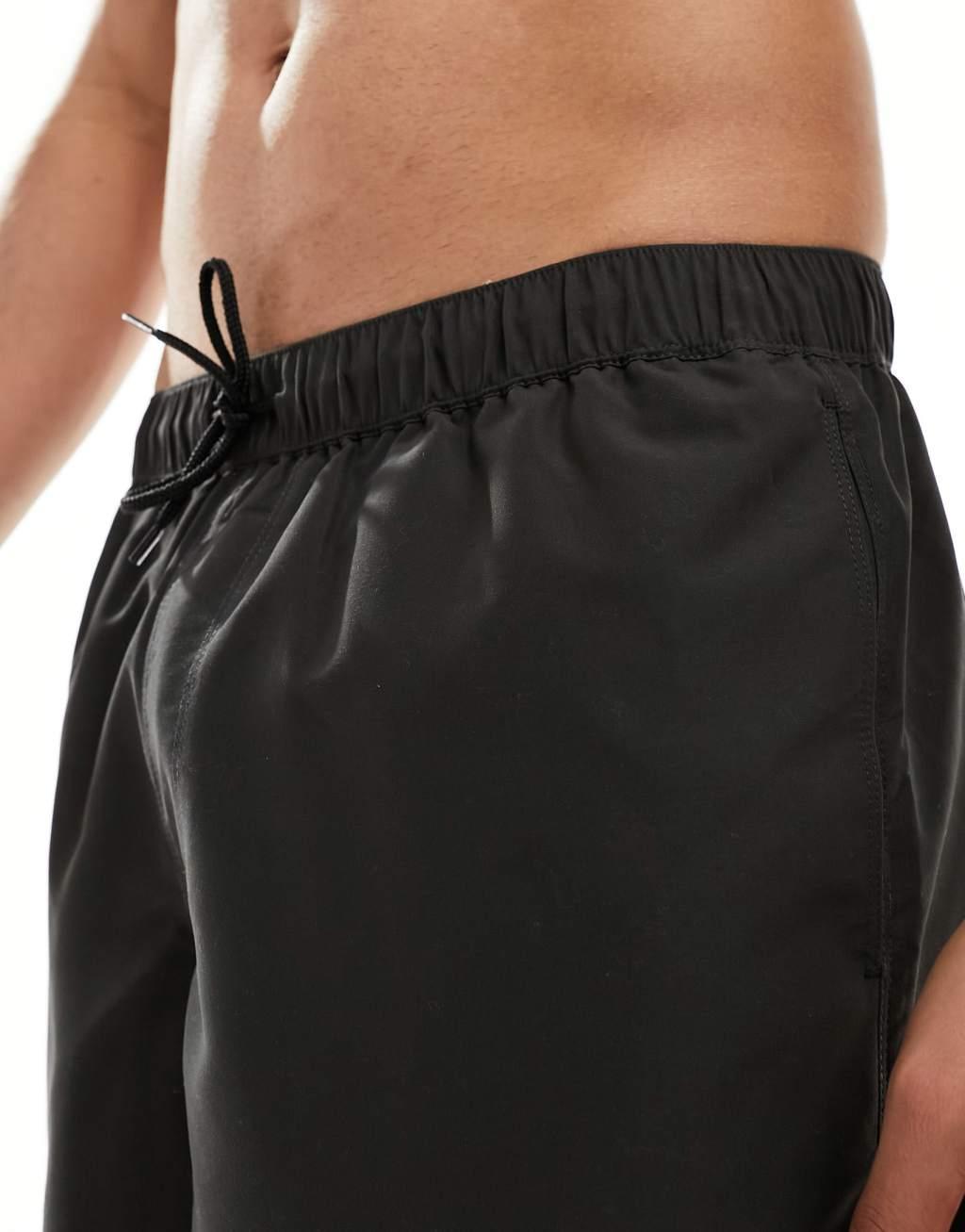 ASOS DESIGN swim shorts in long length in black Product Image