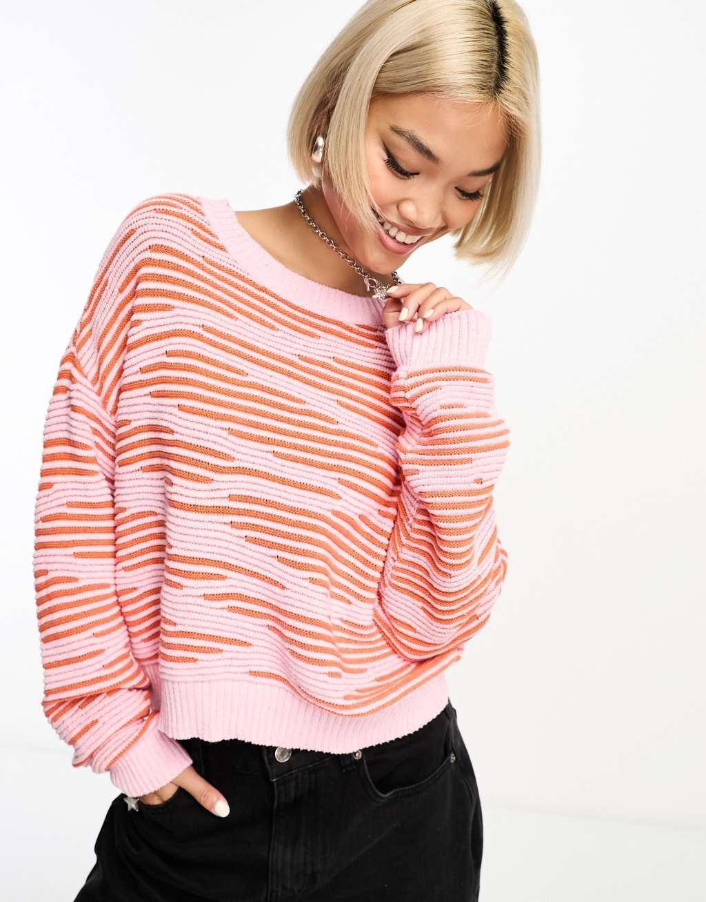 Only textured sweater in pink and orange print  Product Image