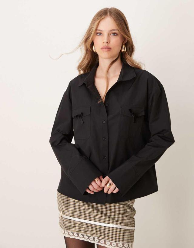 ASOS DESIGN poplin bow pocket detail boxy shirt in black Product Image