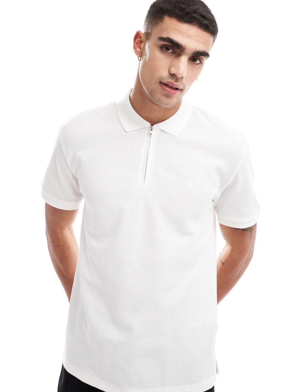 Jack & Jones waffle zip-up polo in white Product Image