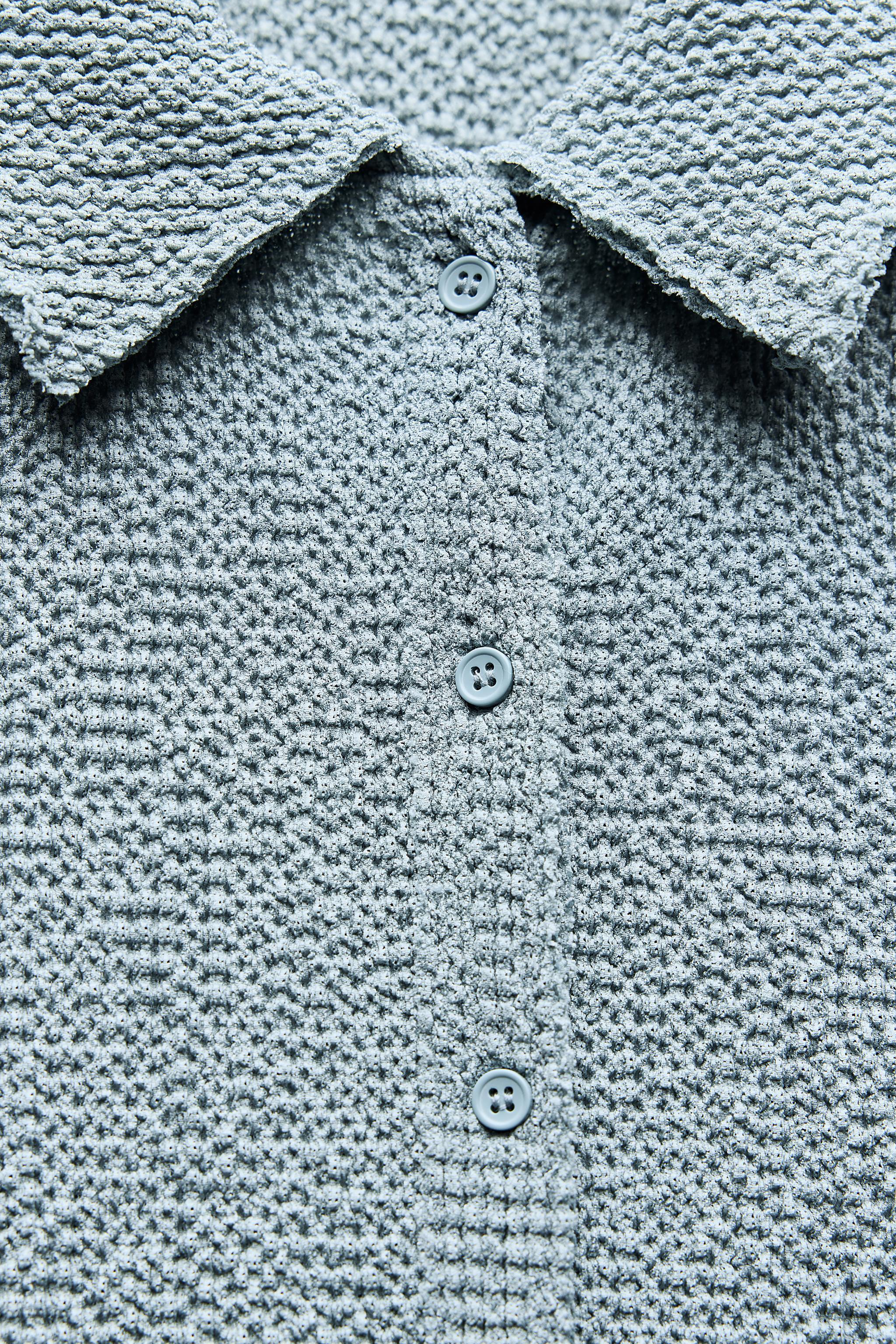 TEXTURED POLO TOP Product Image