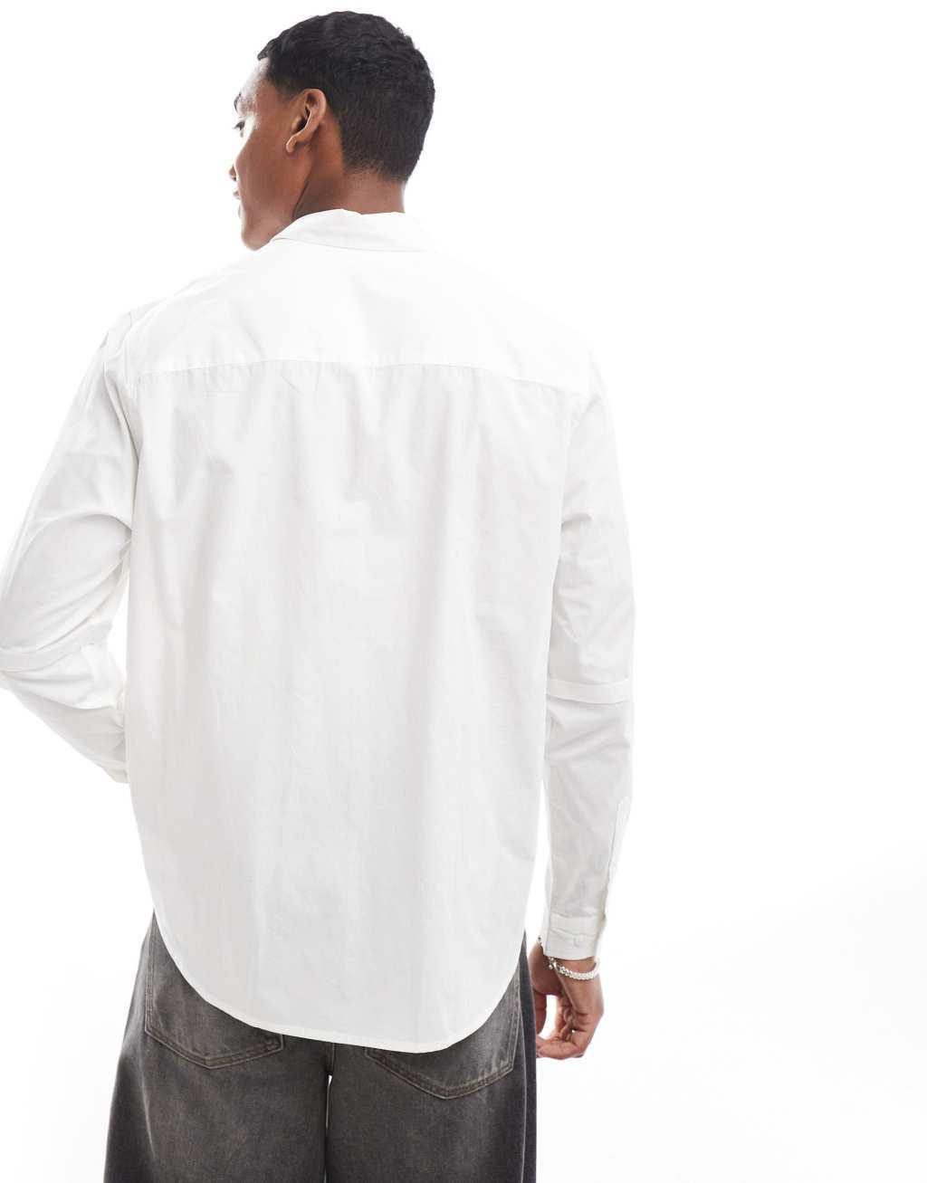 ASOS DESIGN relaxed shirt with double layered sleeve in white Product Image