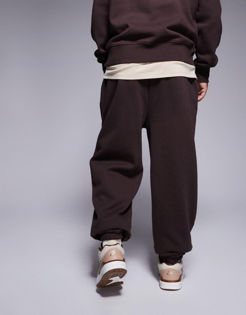 ASOS DESIGN premium heavyweight oversized sweatpants 400gsm in brown Product Image