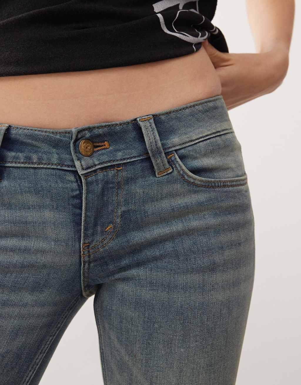 Cheap Monday Booty Bei stretch low rise bootcut jeans in puddly blue tinted wash  Product Image